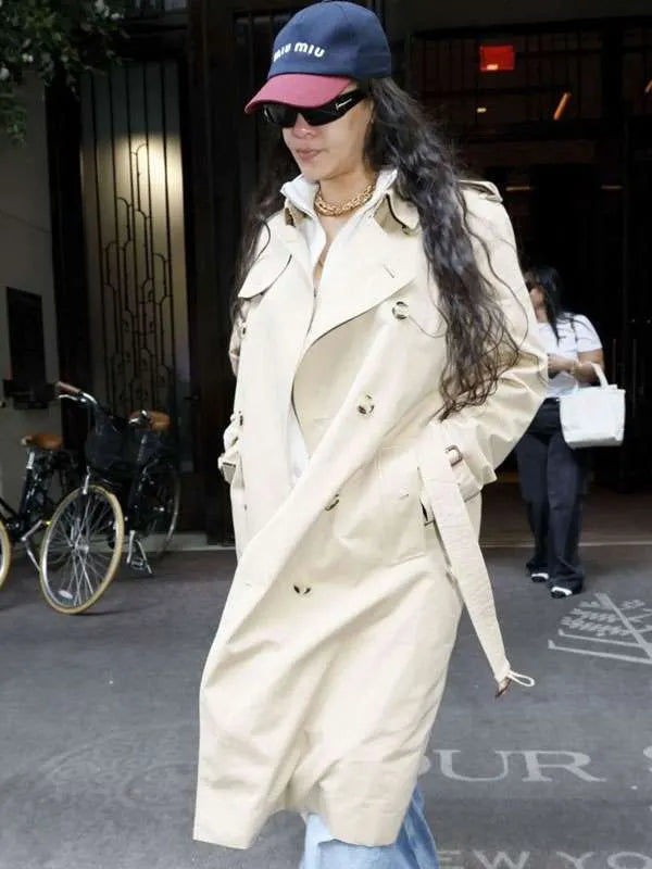 Beige cotton trench coat with double-breasted buttoned closure