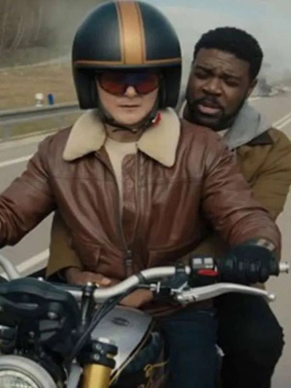Brown leather jacket with two front pockets and full-length sleeves