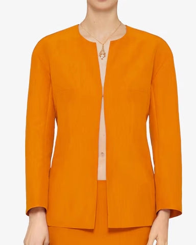 Press Junket Kinds of Kindness Emma Stone Orange Blazer