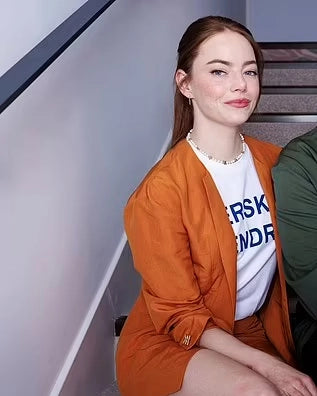 Press Junket Kinds of Kindness Emma Stone Orange Blazer