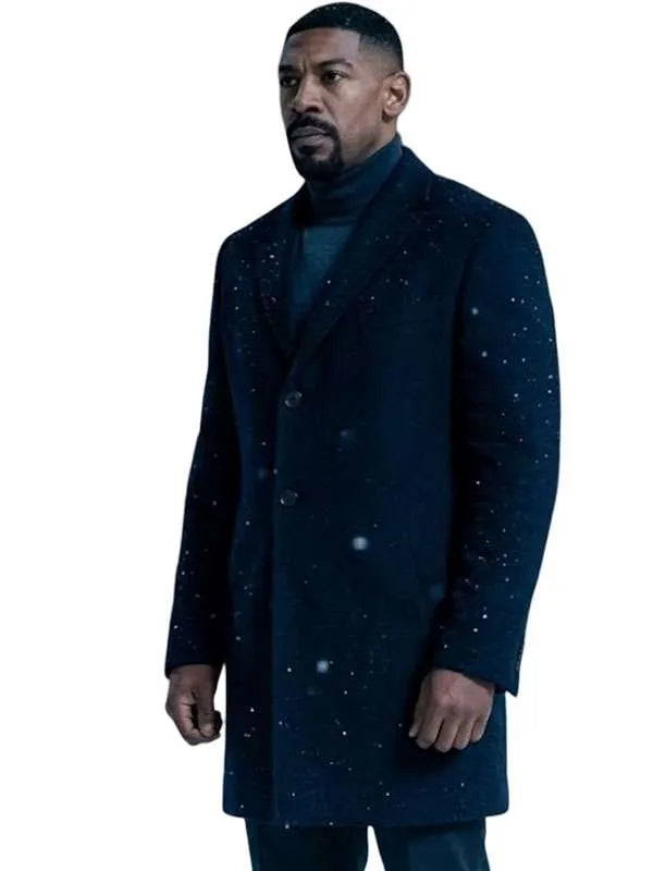 Aaron Pierre black coat with buttoned closure and open-hem cuffs